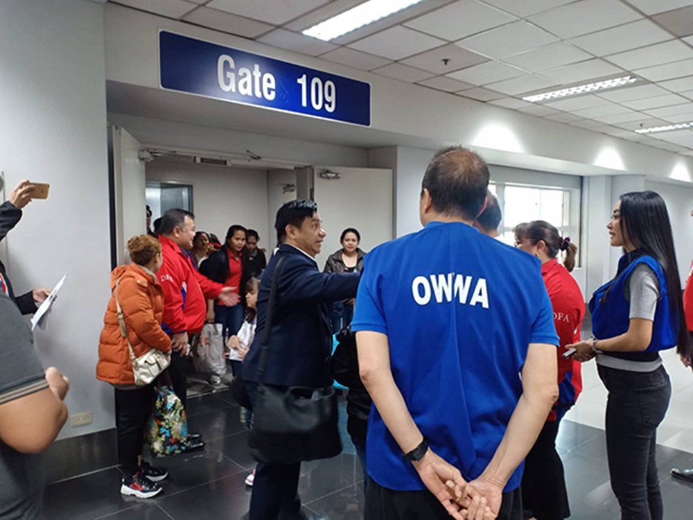 OWWA Repatriates with Torres and Uson